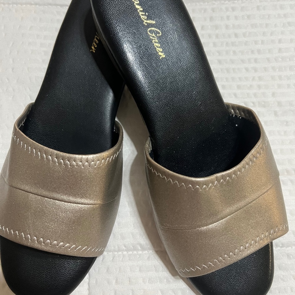 Slip on slippers with a small wedge heel